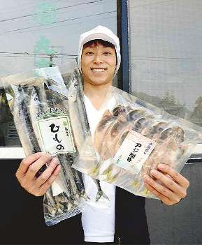 「魚の町尾鷲を元気にできれば」と意気込む有祐さん＝尾鷲市天満浦の「丸高」で